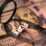 magnifier with tax on dollar